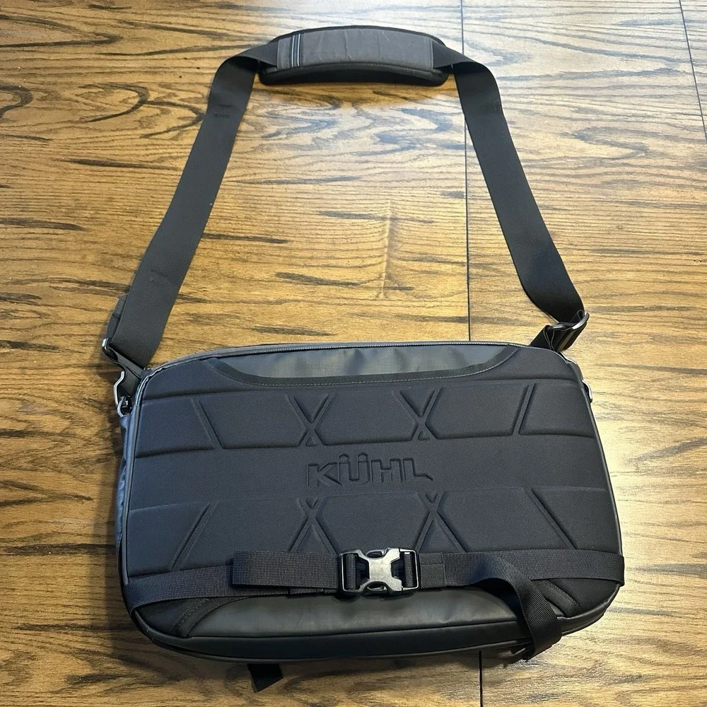 KUHL 14L Eskape Ink Black Kanvas Messenger Bag Laptop Travel Crossbody Carryon